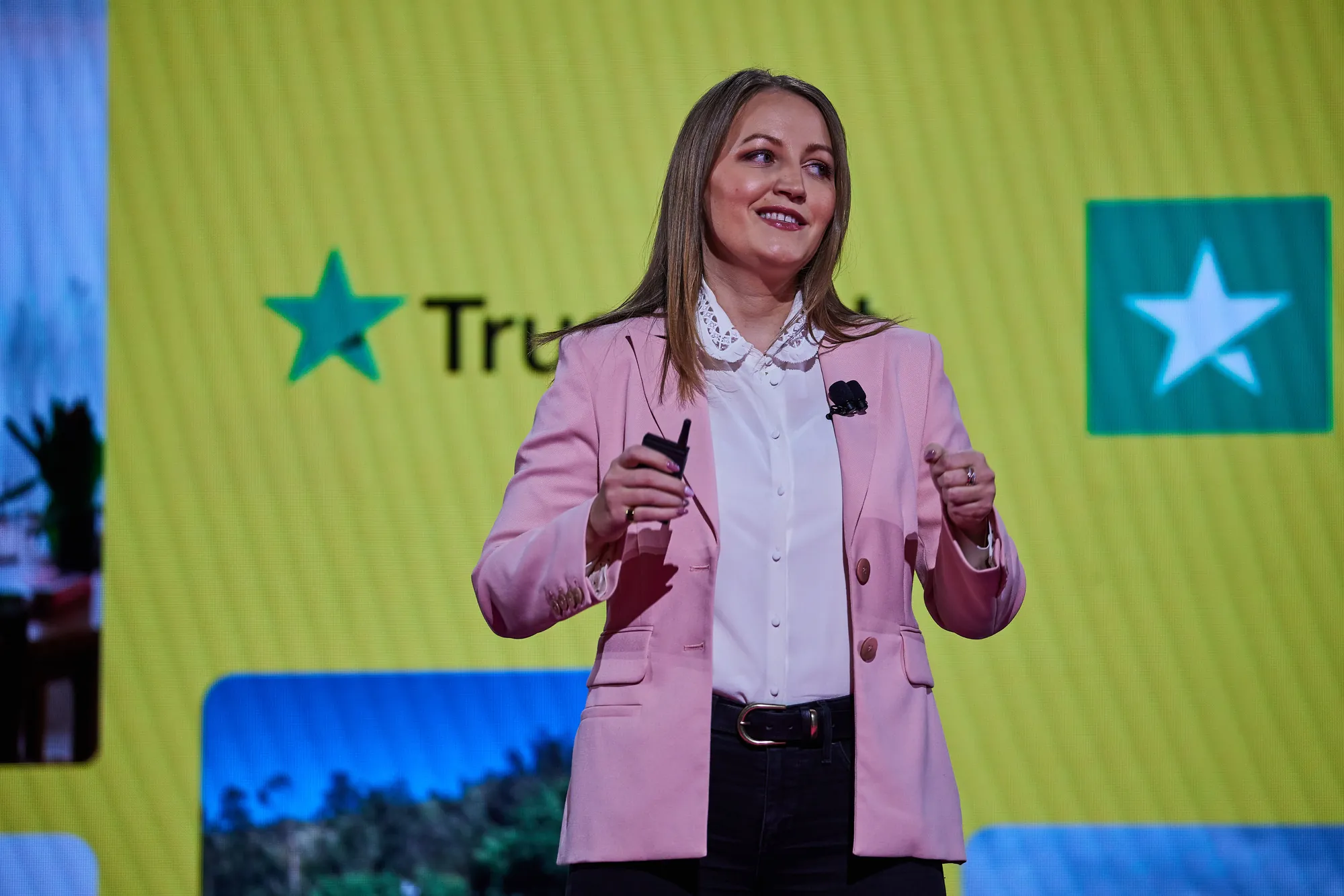 A guest speaker from Trustpilot on stage